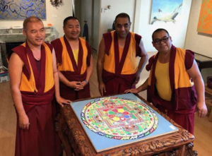 scholars from ngari institute, ladakh, india build a medicine buddha sand mandala at lion's roar dharma center, sacramento, california